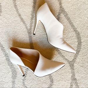 White pointed toe heels